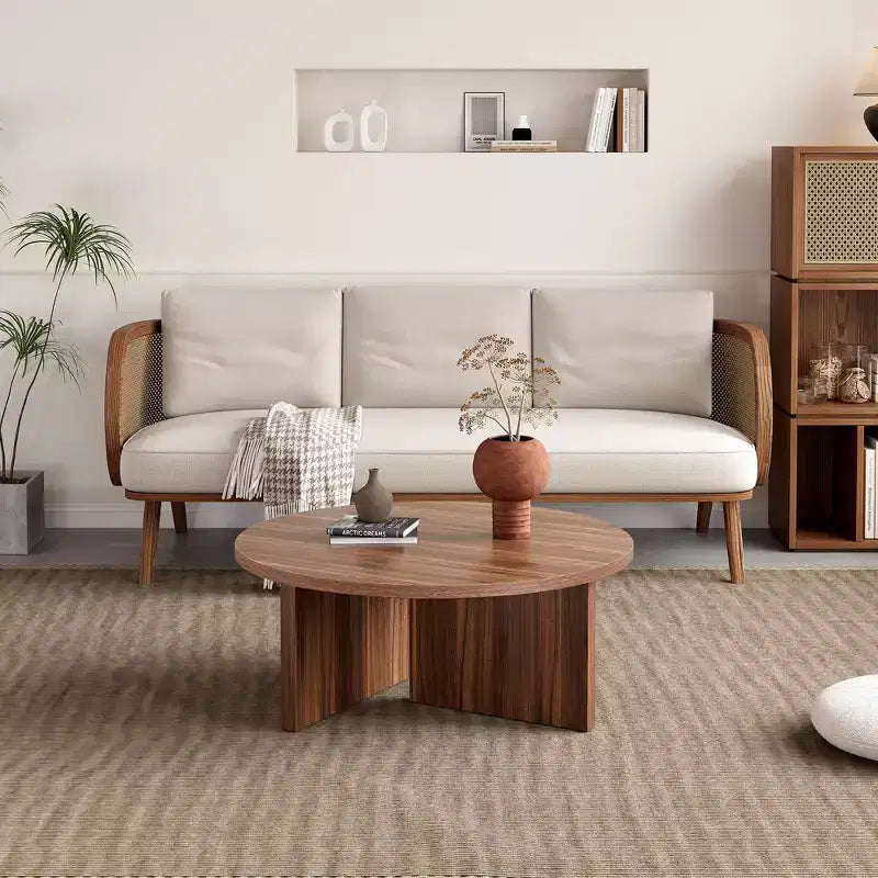 Table basse ronde noire en MDF polyvalente pour différents styles d'intérieur, alliant minimalisme moderne et charme nordique