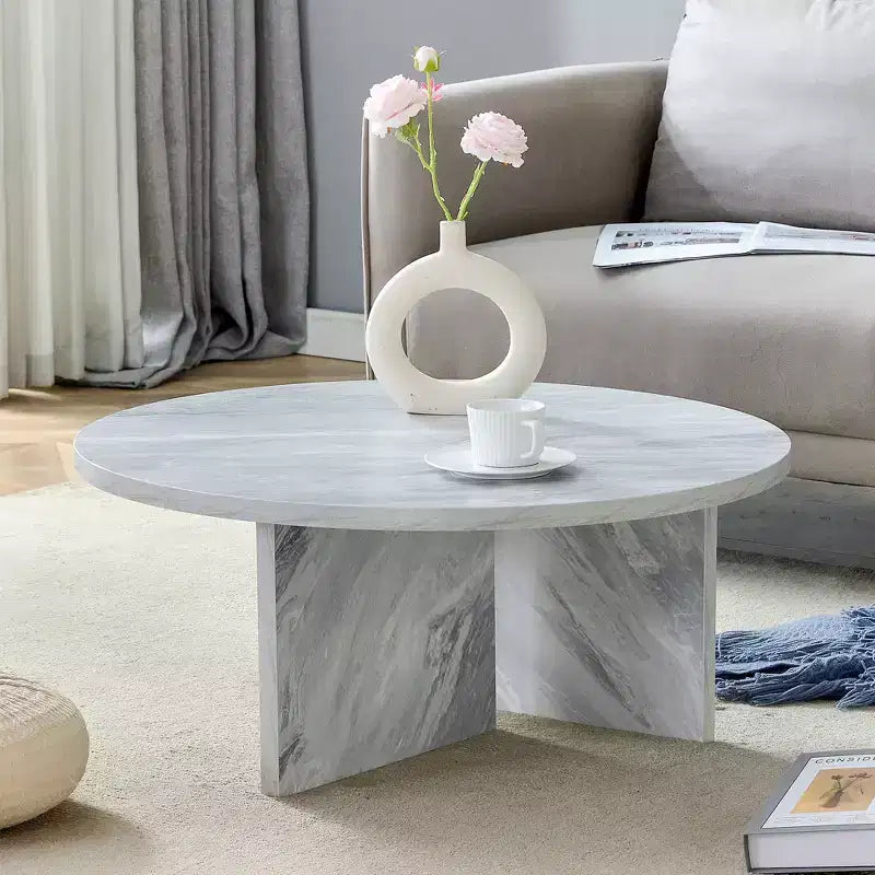 Table basse ronde noire en MDF polyvalente pour différents styles d'intérieur, alliant minimalisme moderne et charme nordique