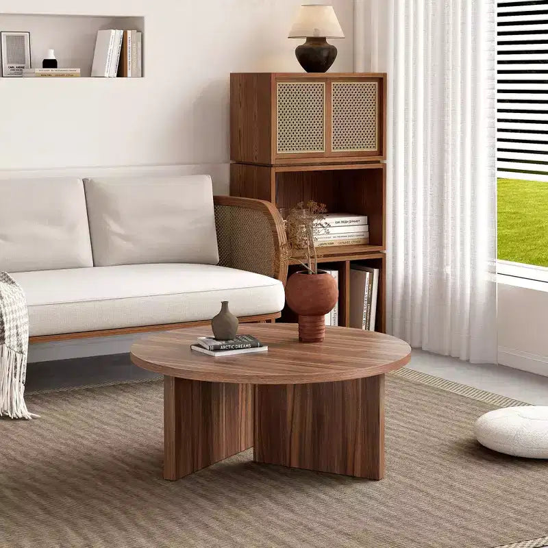 Table basse ronde noire en MDF polyvalente pour différents styles d'intérieur, alliant minimalisme moderne et charme nordique