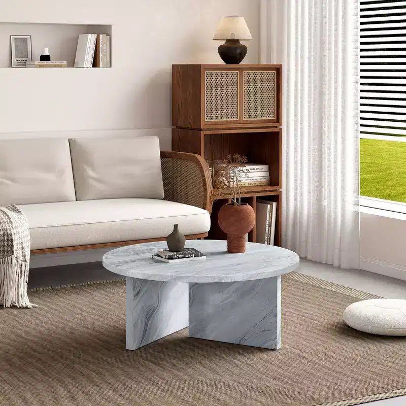 Table basse ronde noire en MDF polyvalente pour différents styles d'intérieur, alliant minimalisme moderne et charme nordique