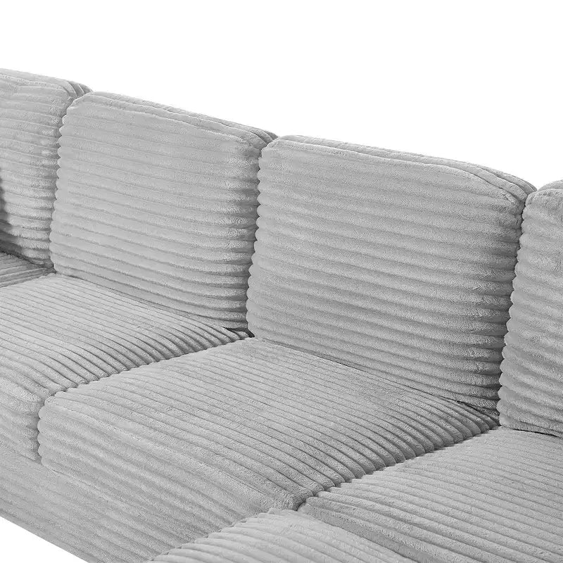 Canapé d'angle en velours côtelé Whisen avec pouf mobile et poches de rangement latérales