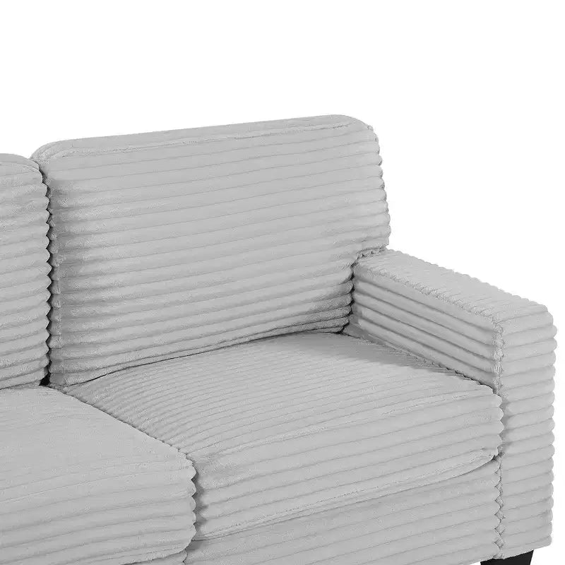 Canapé d'angle en velours côtelé Whisen avec pouf mobile et poches de rangement latérales